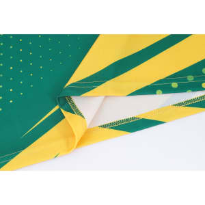 A green and yellow long-sleeve sports shirt featuring a micro mesh design and a logo on the fabric.
