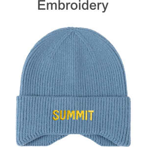 A blue earflap beanie with a ribbed texture and yellow embroidery. Features a logo on the front.