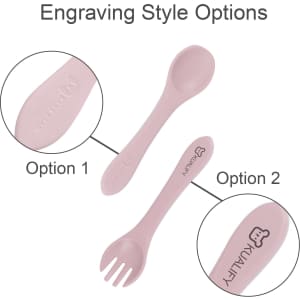 Two pieces of pink silicone cutlery, including a spoon and fork, with an engraved logo on each piece.