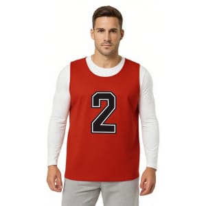 A reversible training bib in red with a large black number 2, worn over a white long-sleeve shirt.
