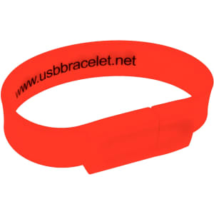 A rectangular silicone wristband flash drive in bright orange, featuring a logo on the inside.