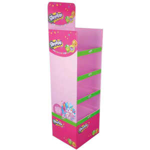 A freestanding pink and green cardboard display unit with four shelves and a logo at the top.