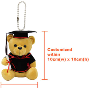 A plush bear keyring in graduation attire, featuring a black cap and gown, with a chain for attachment.