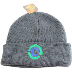 A grey knitted beanie with a folded cuff and a logo on the front.