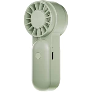 A mini portable handheld fan in a soft green colour, featuring a circular fan design and a control button.