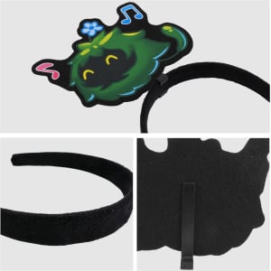 A black felt headband featuring a playful green character with musical notes and a flower design on top.