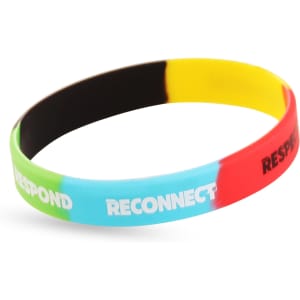 A silicone wristband featuring sections in green, blue, yellow, red, and black. Includes a logo.