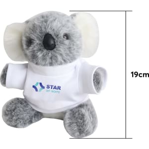 A grey koala plush toy wearing a white shirt, measuring 19 cm. The toy has a small logo on its shirt.