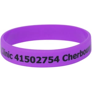 A purple silicone wristband featuring printed text and a logo.