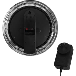 A double ring neon wall clock with a clear casing, featuring a black back and a power adapter.