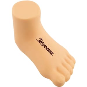 A beige leg-shaped stress reliever with a smooth texture and a logo on the side.