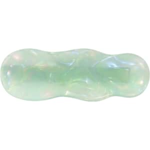 A ripple iridescent alligator hair clip in soft green tones with a glossy, wavy design and a logo.