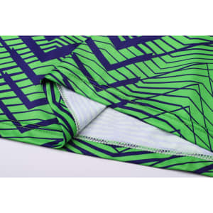 A vibrant green and navy patterned unisex long sleeve shirt featuring a V-neck design and soft fabric.