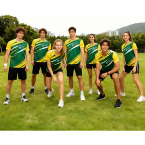 A group of six individuals wearing yellow and green polyester sports tee shirts poses outdoors on grass.