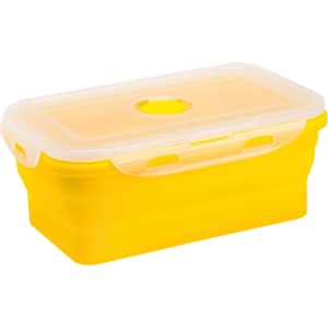 A collapsible silicone food storage container in bright yellow with a clear lid and a circular vent.