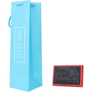 A drink bottle paper bag in light blue with a handle, accompanied by a black rectangular item featuring a logo.