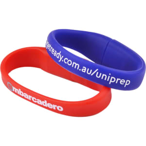 A red and blue oval silicone wristband flash drive, each featuring a logo and text.