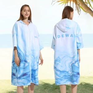 A hooded change towel in a blue and white marbled design, featuring a zip and a logo on the back.