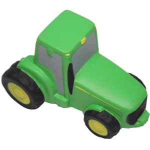 A green tractor-shaped stress reliever with black tyres and yellow accents. It has a simple, cartoonish design.