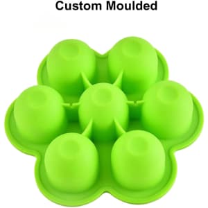 A green silicone ice cube tray shaped like a flower, featuring six moulded compartments for ice cubes.