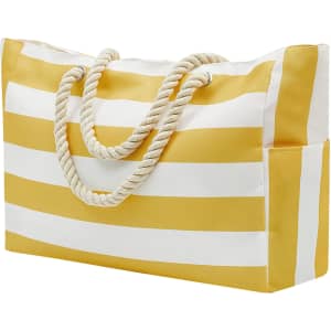 A yellow and white striped beach bag with rope handles and a side pocket. It features a simple logo.