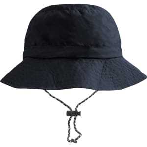 A foldable bucket hat in solid navy blue with an adjustable chin strap and a textured brim.