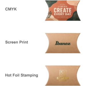 A small brown kraft pillow box featuring various printing techniques and a logo, with a curved design.