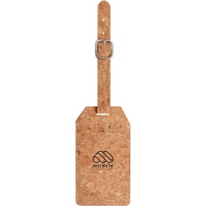 A cork luggage tag with a silver buckle, featuring a logo, in natural cork colour.