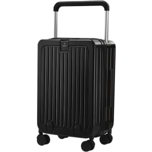 A hardside suitcase in black, featuring a vertical ribbed design, retractable handle, and wheels for mobility.