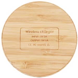 A round bamboo wireless charger with a smooth surface and a logo on it, featuring natural wood tones.