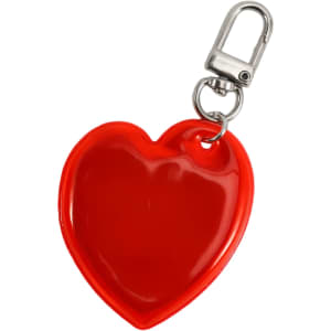 A red heart-shaped keychain with a silver clip attached. The keychain has a glossy finish and includes a logo.