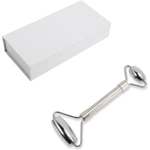 A stainless steel facial roller with a sleek design, accompanied by a plain white box for packaging.