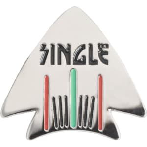 A custom soft enamel golf ball marker in an arrow shape, featuring red, green, and black details. It has a logo.