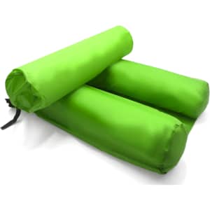 A bright green inflatable floating chair rolls up for easy storage. Includes a logo on the fabric.