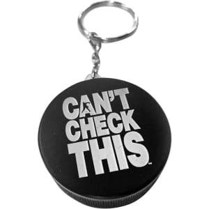 A black keyring featuring a hockey puck stress reliever with white text and a metal attachment.