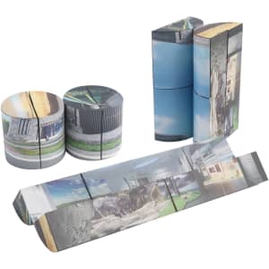 A 3D Flips Cylinder Magic Cube featuring a mix of grey and blue with photographic designs on its faces. It includes multiple connecting pieces and a logo.