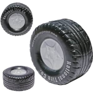 A black tire-shaped stress reliever with a grey centre, featuring a logo on the side.