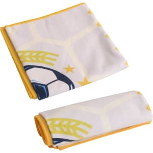 A folded Colour Sports Towel in yellow and white with a soccer ball design, featuring edging in yellow.
