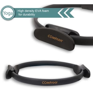 A black Pilates circle made of high-density EVA foam, featuring a branded logo.