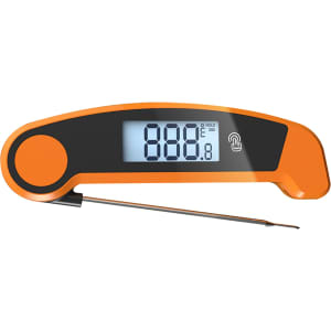 An orange digital instant read meat thermometer with a large display showing temperature readings.