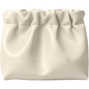 A cream-coloured portable makeup bag with a gathered design. It has a smooth, shiny finish and features a logo.