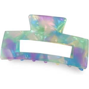 A hair claw clip in iridescent pastel colours, featuring a rectangular opening and multiple gripping teeth.