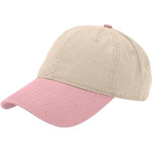 A solid fashion cap in beige with a pink peak, featuring a logo on the side.