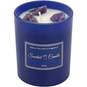 A 6.6oz blue glass candle featuring natural soy wax and purple crystals on top. It has a logo on the front.