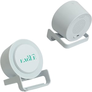 A white night light speaker with a wireless charger, featuring a simple design and minimal branding.