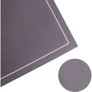 A grey diatomite floor mat featuring a subtle border design and a circular inset showing the texture.