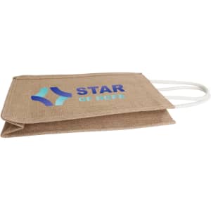 A jute double wine carrier in a natural brown hue with white handles and a logo printed on the front.