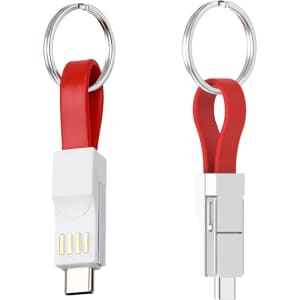 A magnetic charging cable in red, featuring a keyring attachment and a white connector, with logos present.