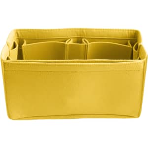 A yellow felt bag organiser with multiple compartments for storage and organisation. It has a simple, soft design.