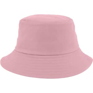 A pink cotton bucket hat with a soft, structured design and a wide brim. It features a logo on the side.
